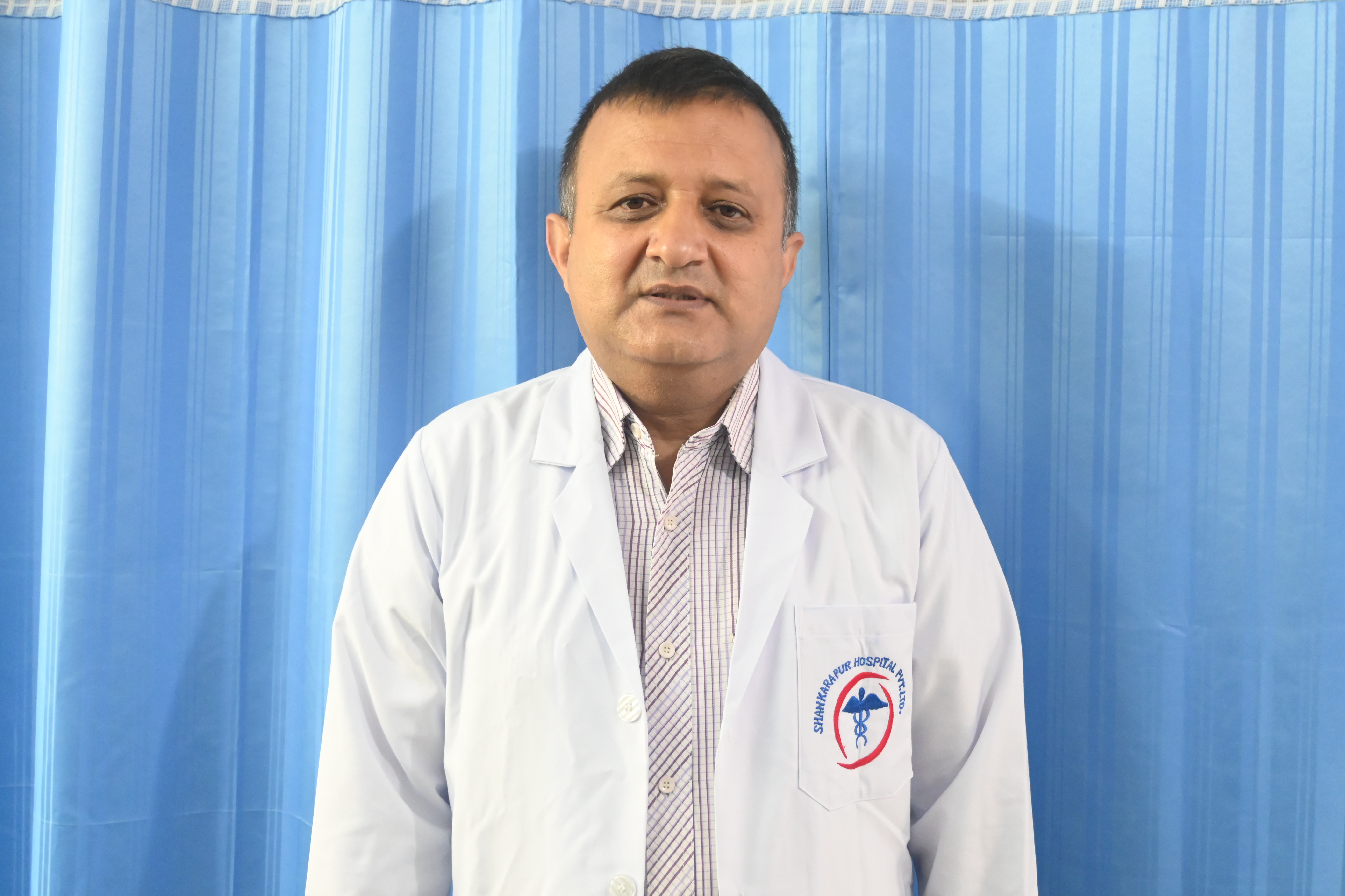 Dr. Khem Raj Adhikari